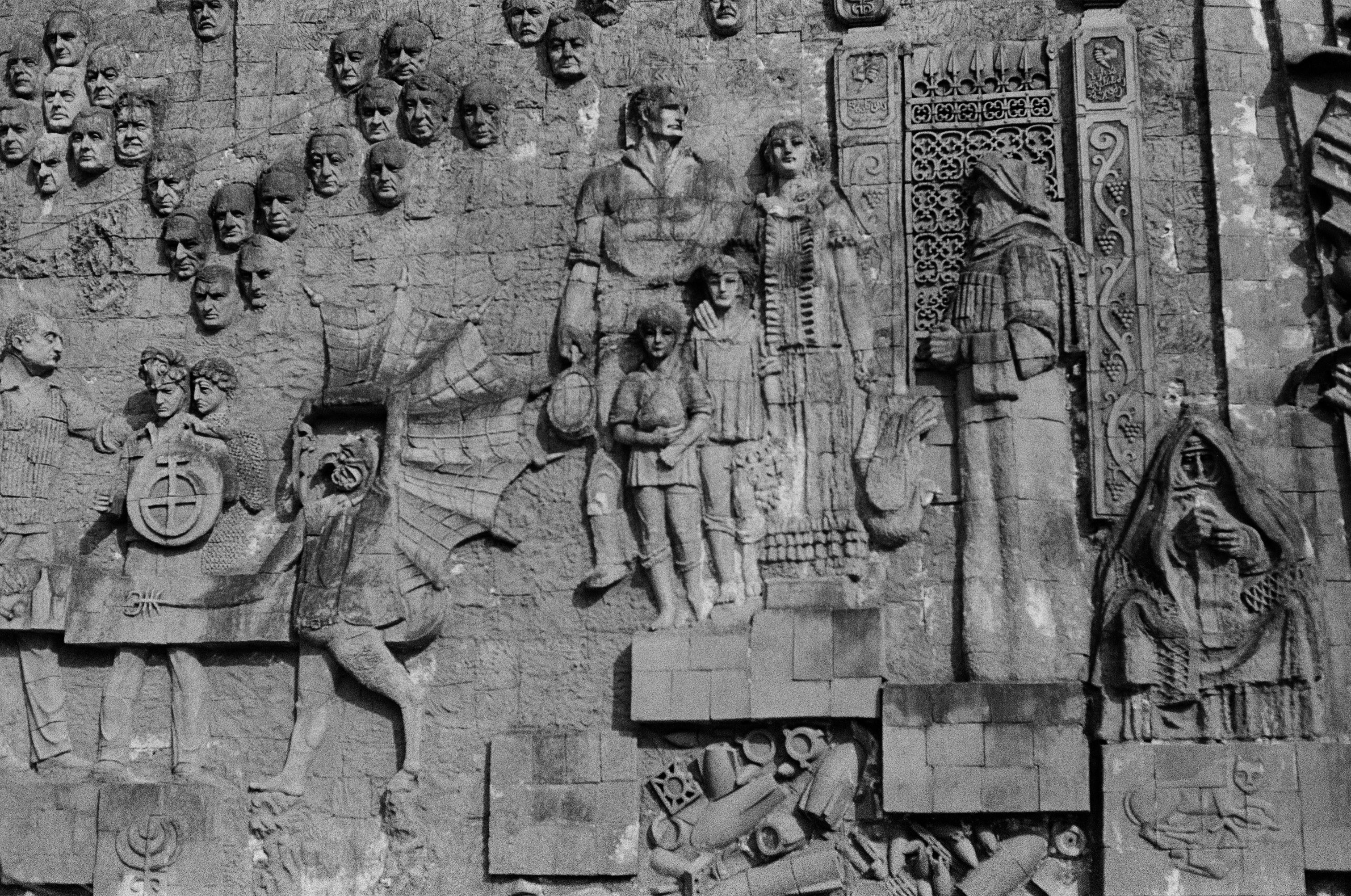 A picture of a ceramic panel located at the entrance of the Kutaisi Central Bazaar, called The Kolkheti Relief